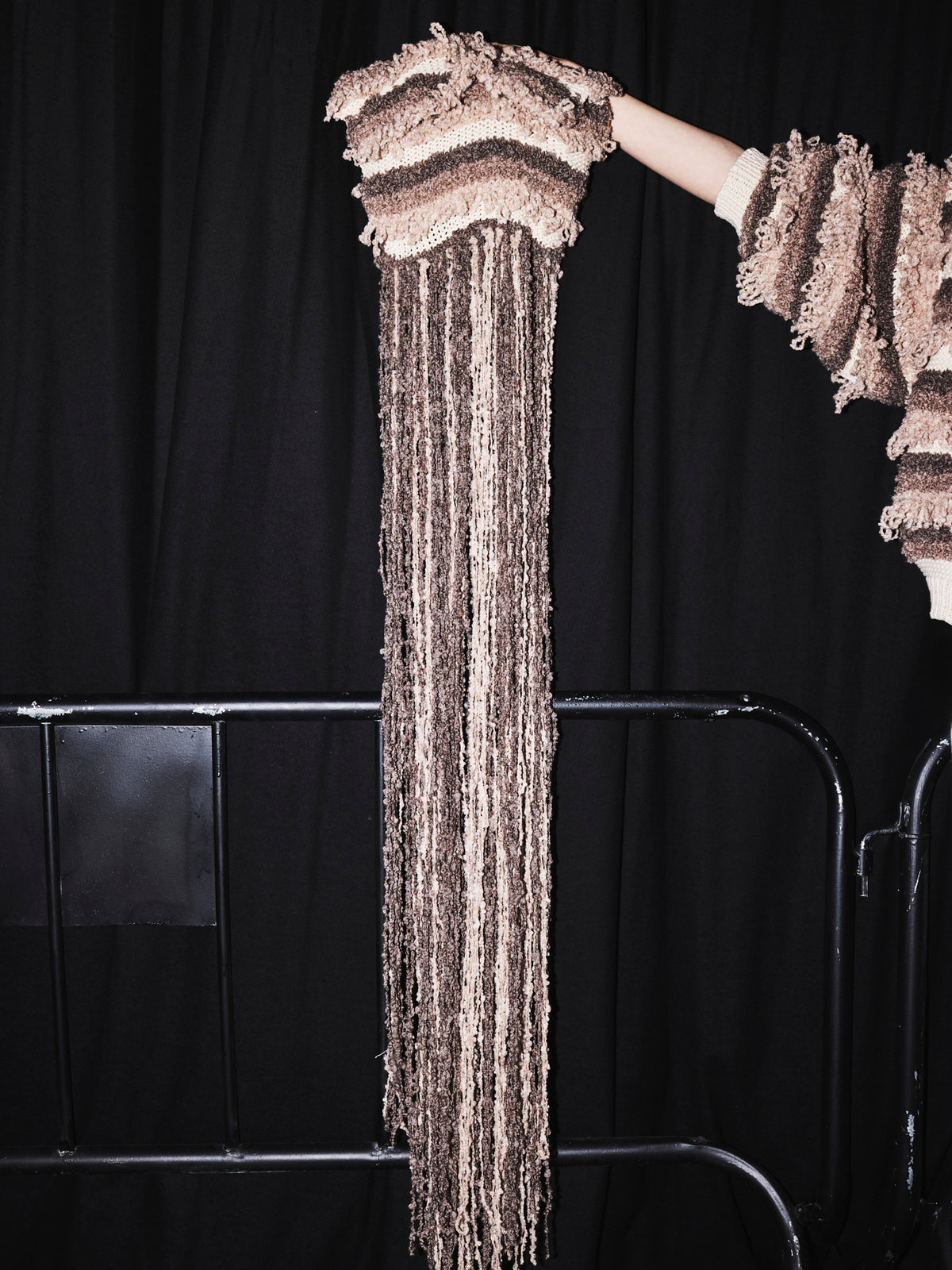 Knitted bag with long fringes