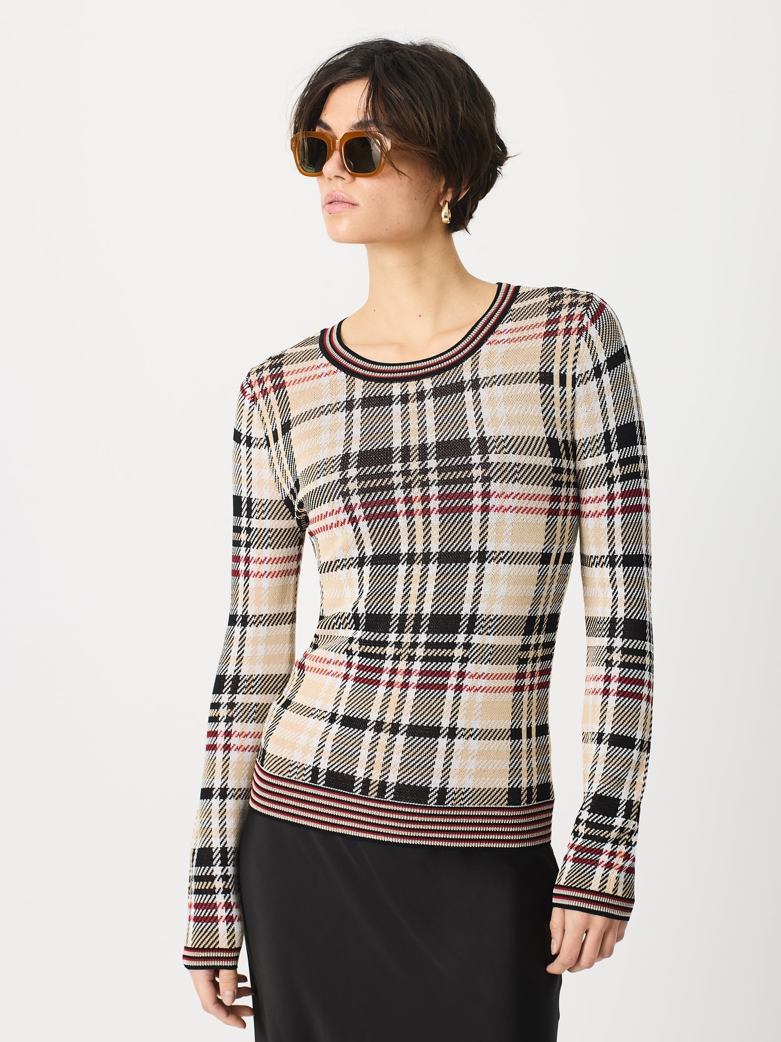 Jersey con cuadros en cuerpo y mangas y contraste de rayas en cuello, puños y bajos