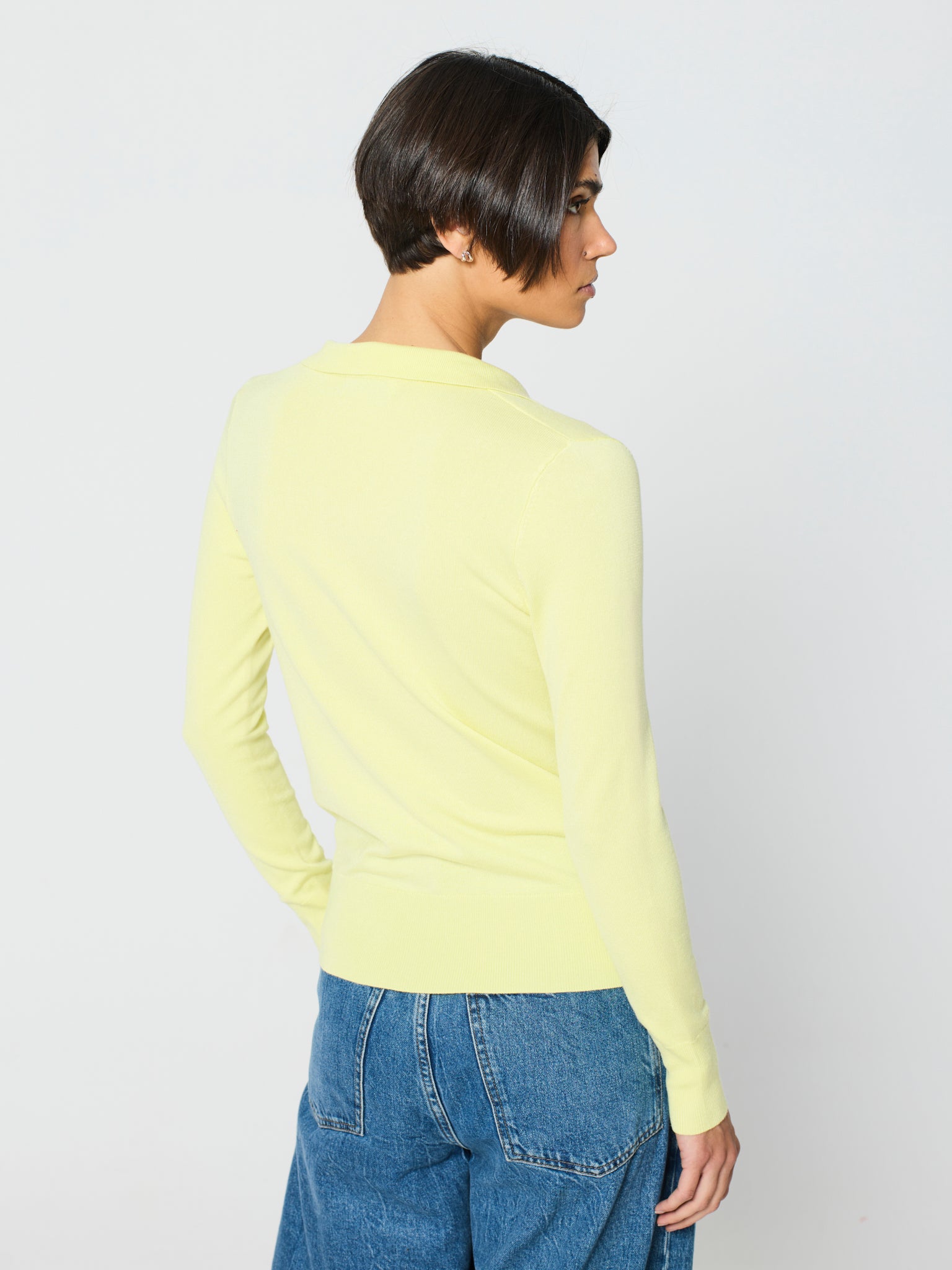 Jersey cuello polo y manga larga con detalle canalé ancho en puños y bajo