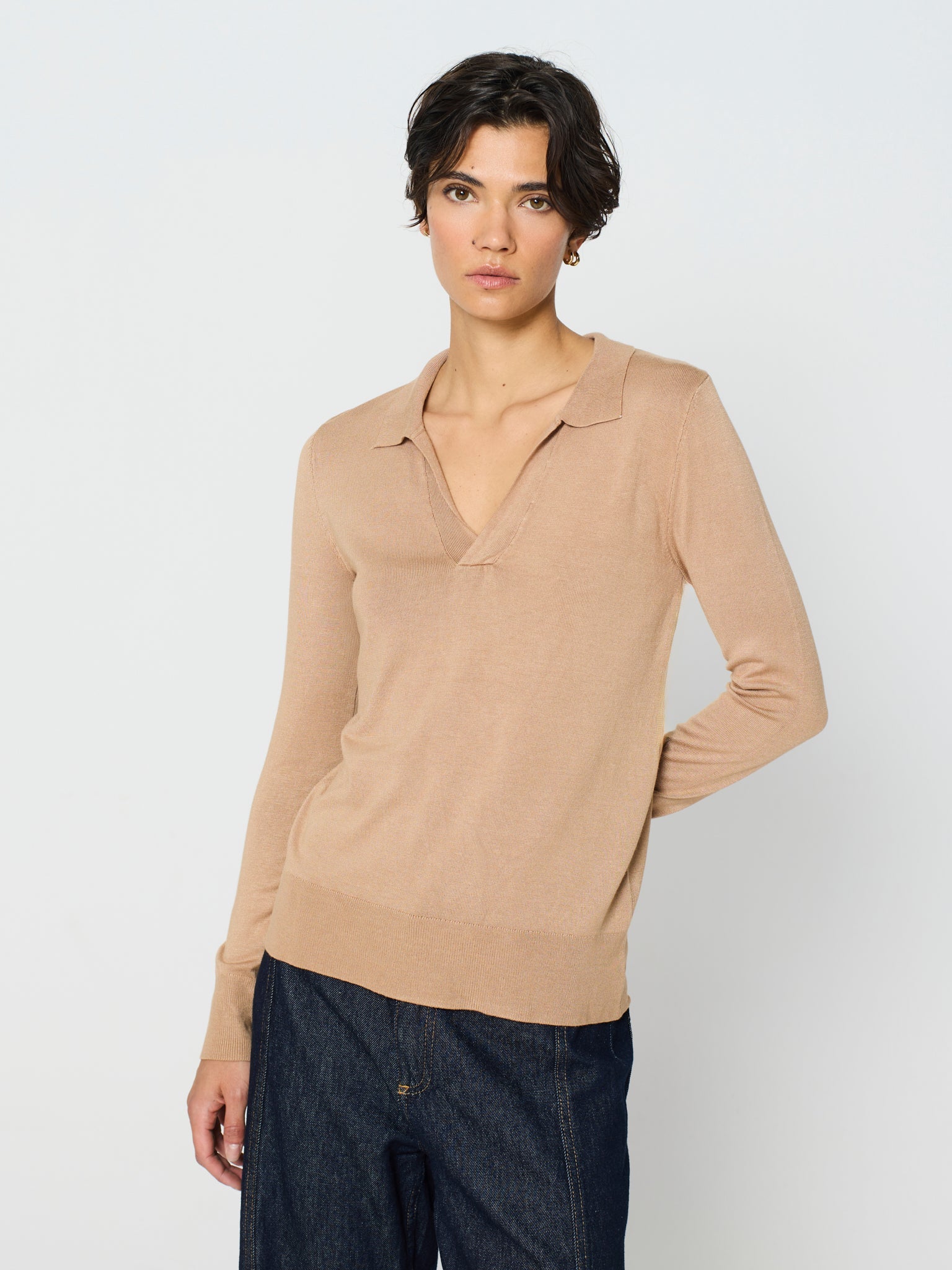 Jersey cuello polo y manga larga con detalle canalé ancho en puños y bajo