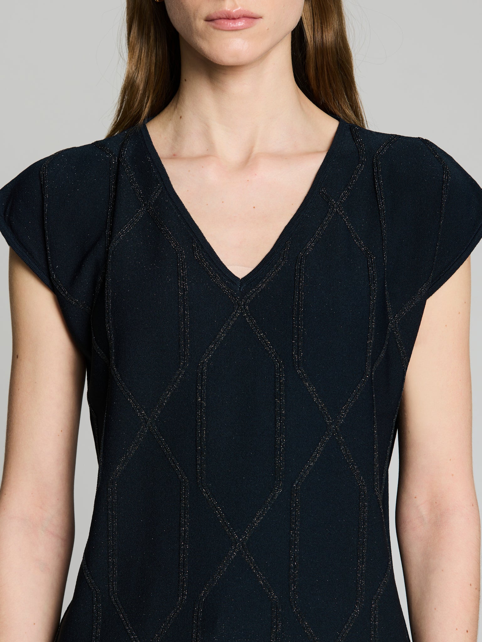 Jersey geométrico lúrex