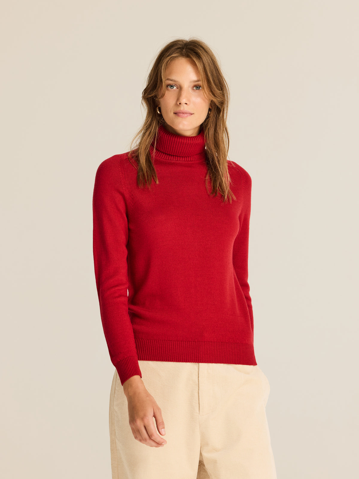 Knitted jumper with high neck