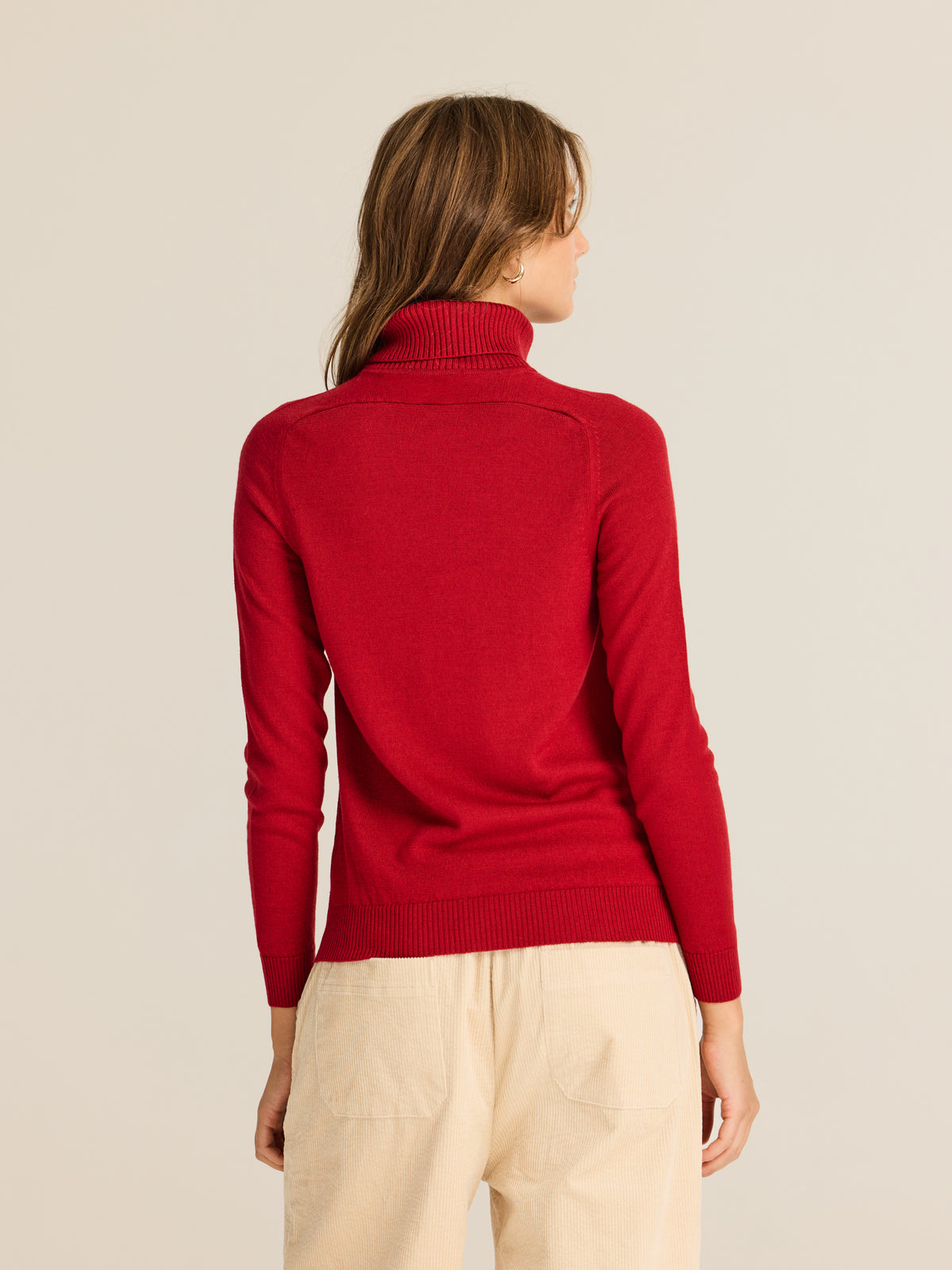 Knitted jumper with high neck