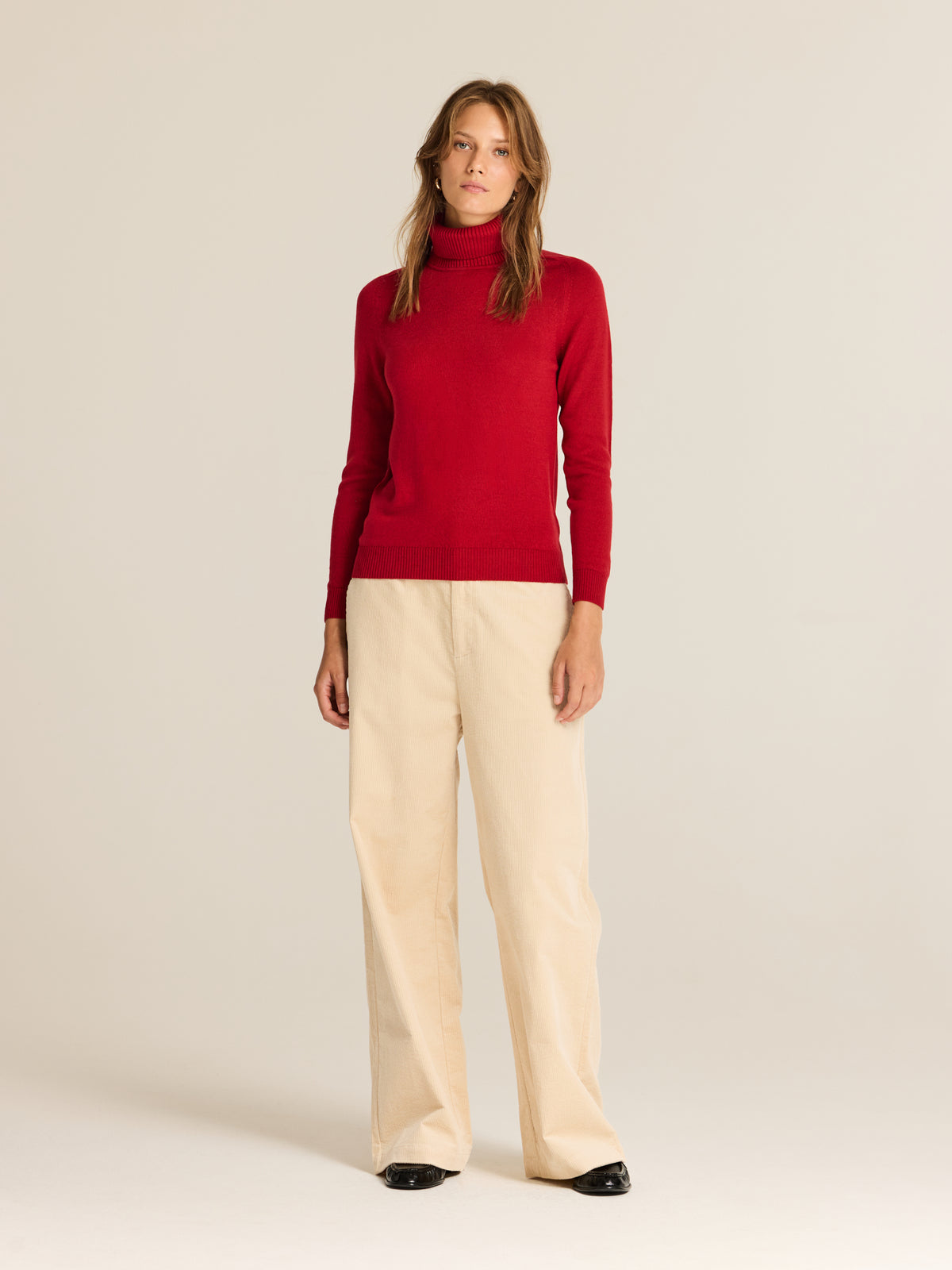 Knitted jumper with high neck