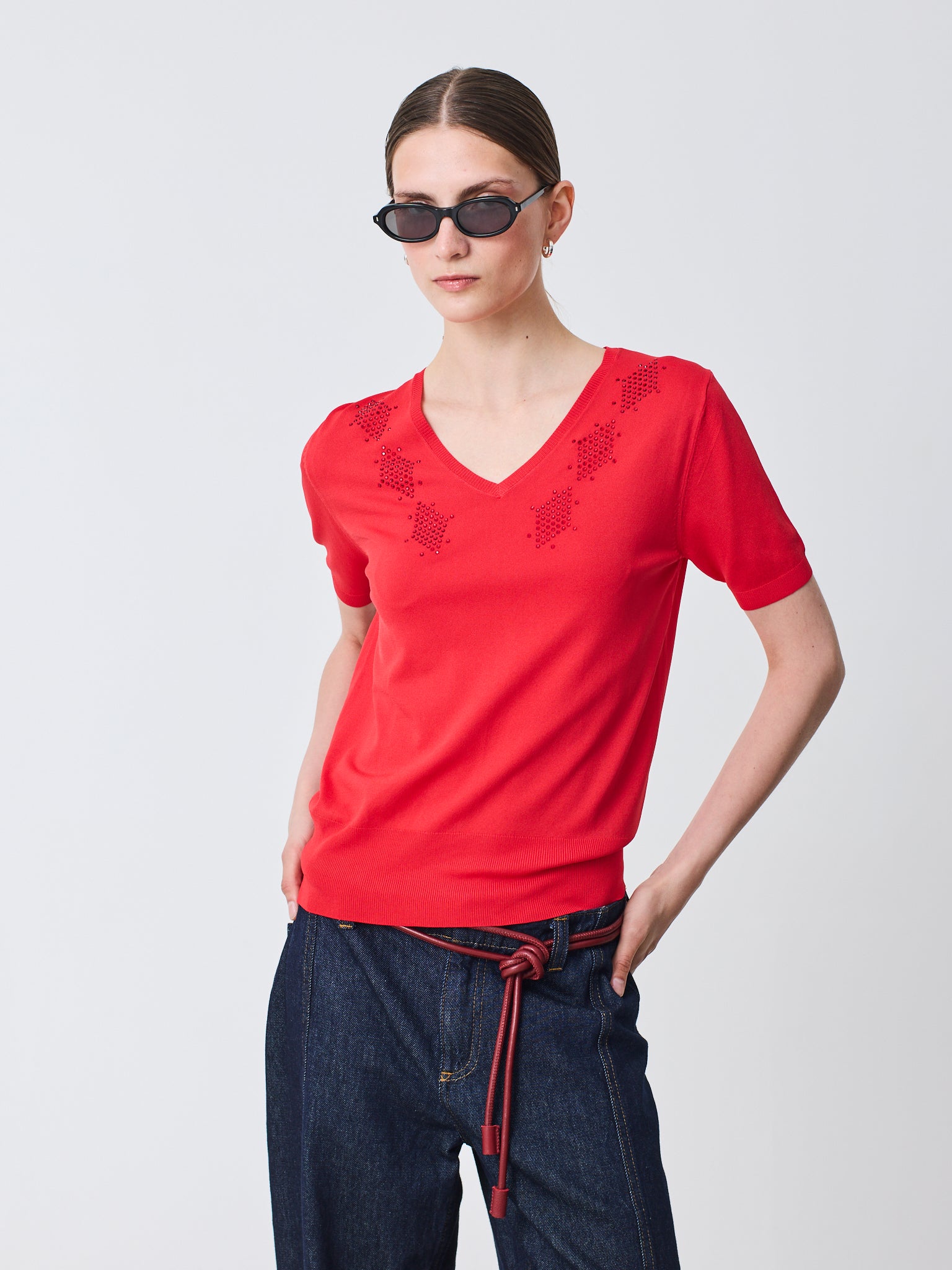 Jersey cuello pico con escote en forma de rombos y manga corta