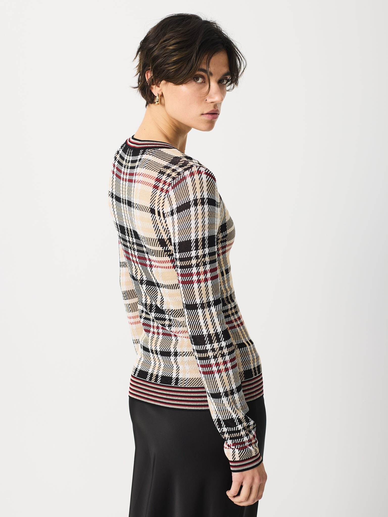 Jersey con cuadros en cuerpo y mangas y contraste de rayas en cuello, puños y bajos