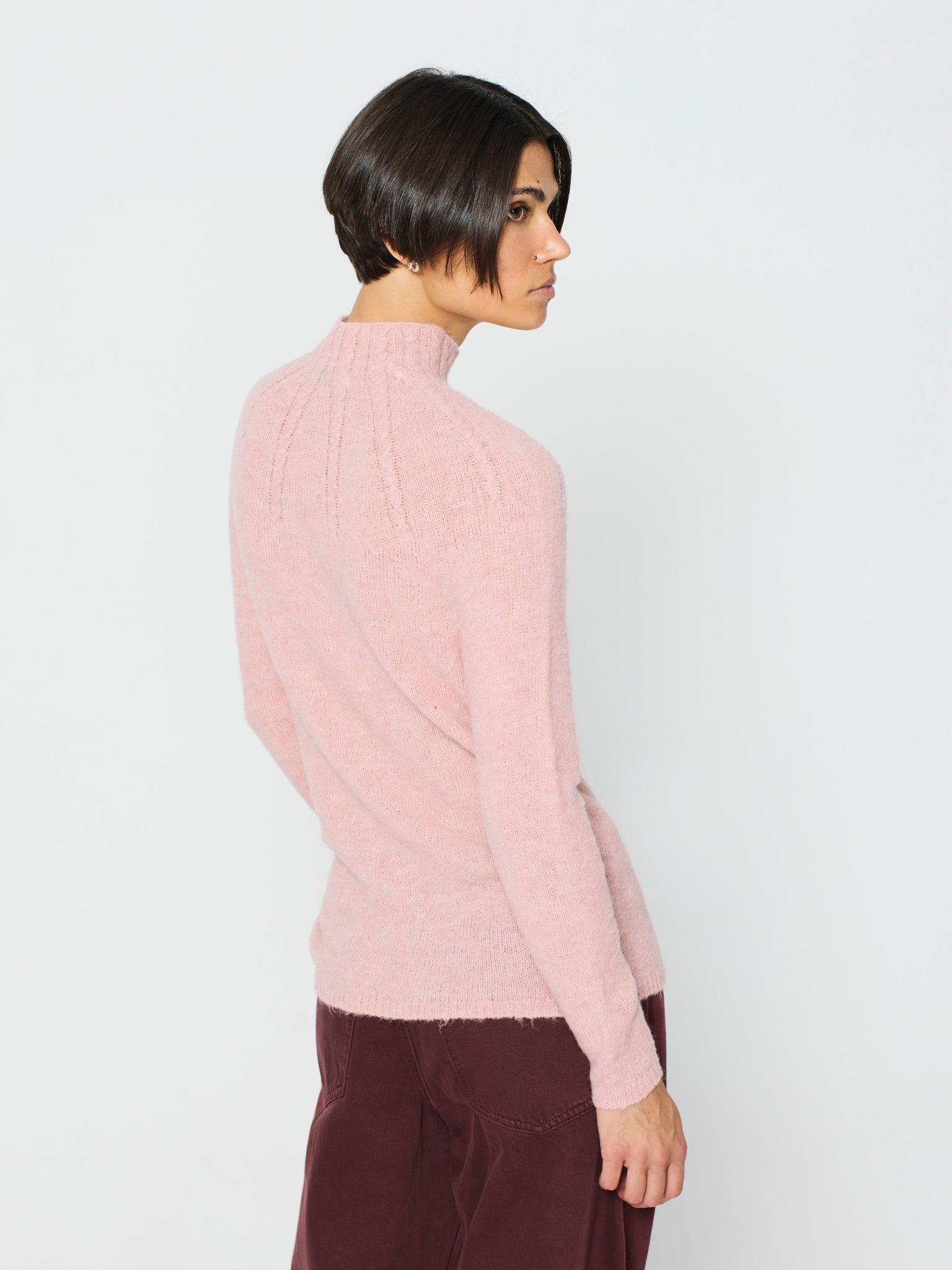 Jersey de cuello cisne con trenzas