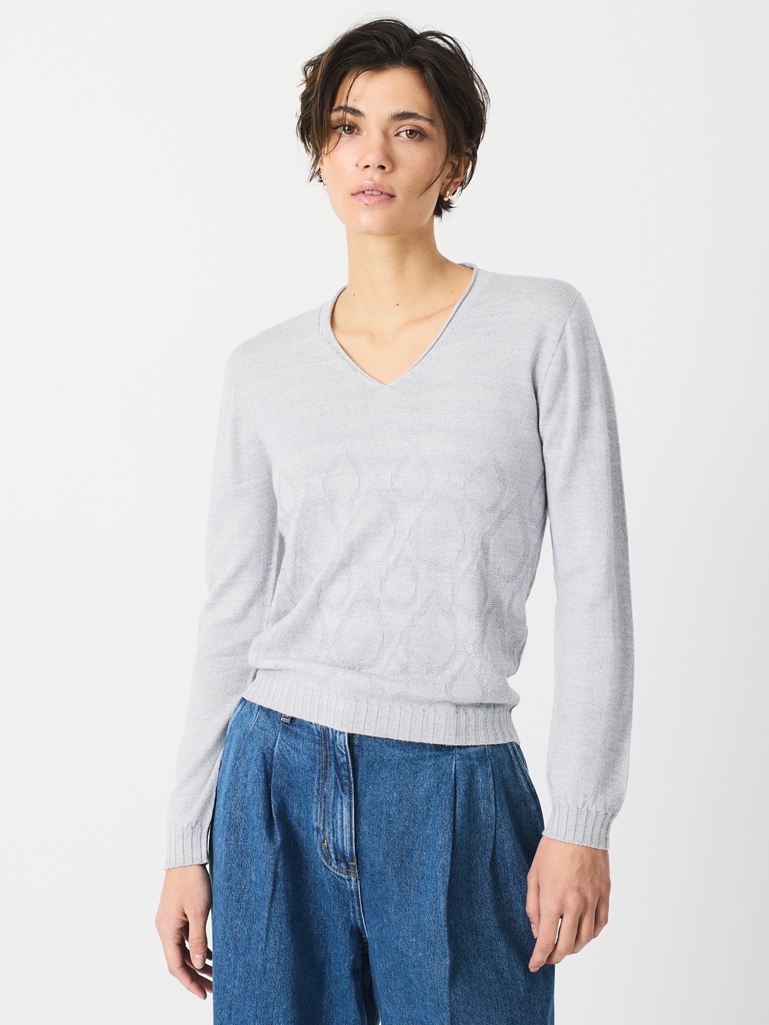 Jersey de cuello pico con adorno en delantero
