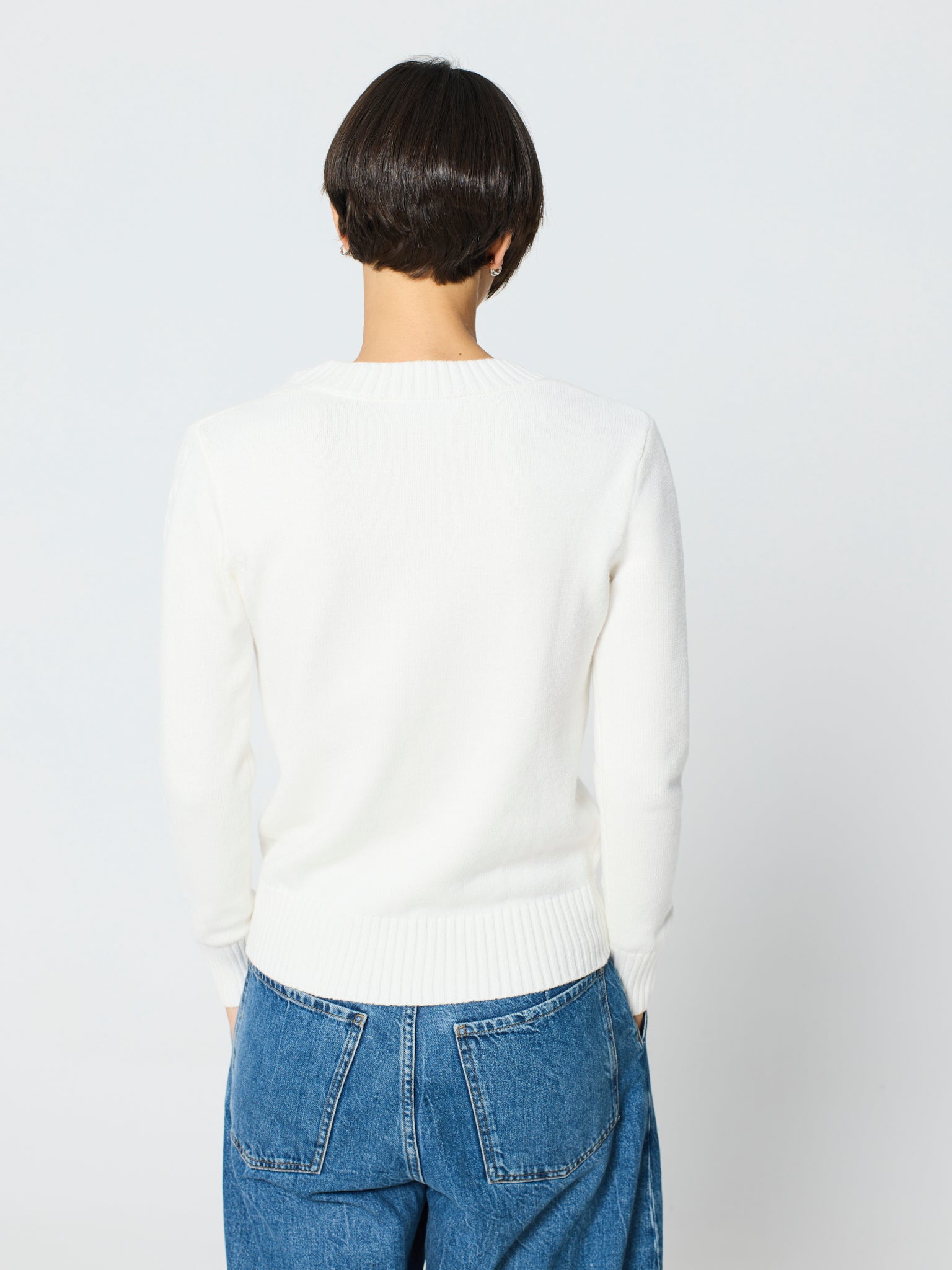 Jersey trenzado cuello pico