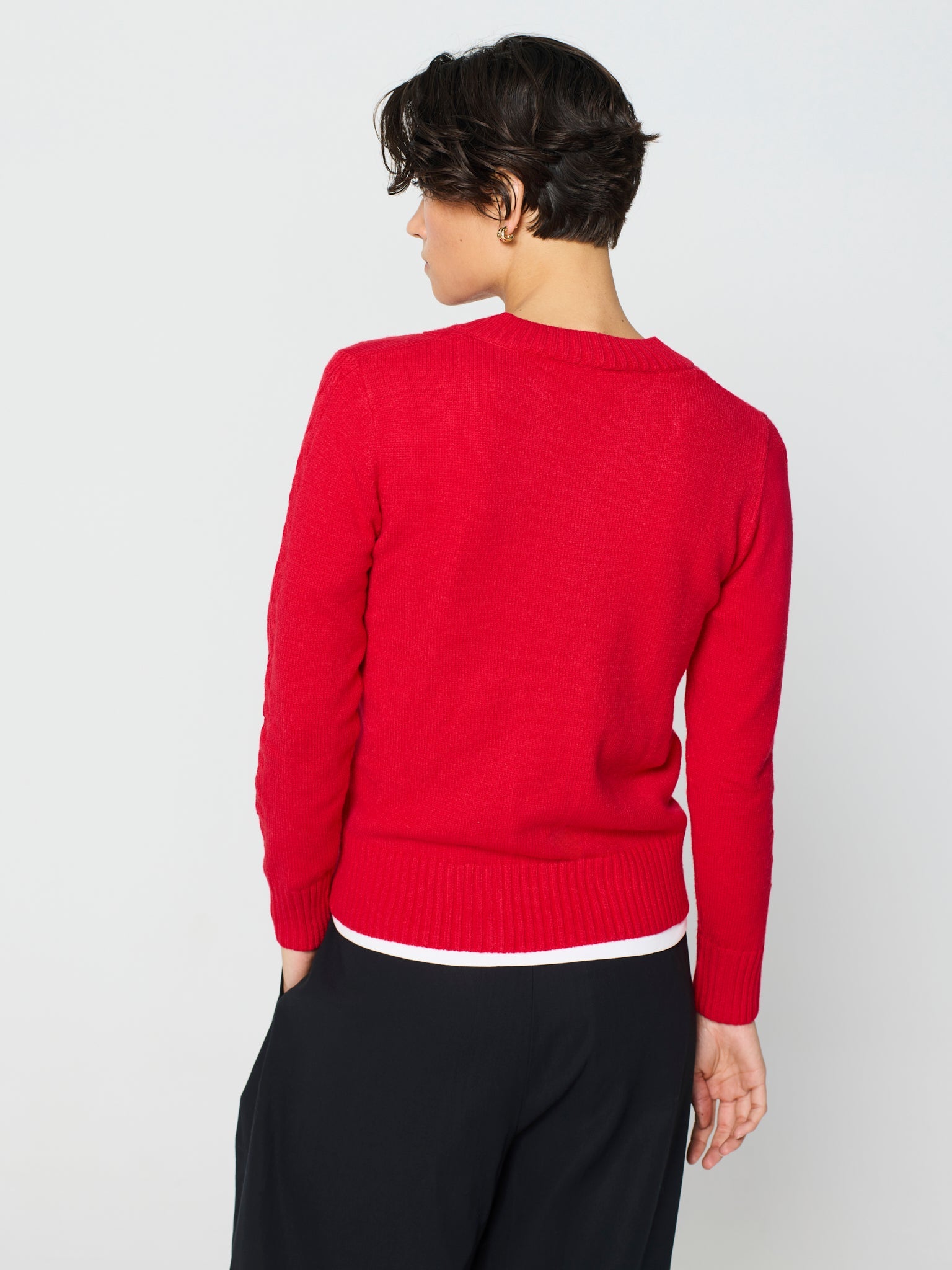 Jersey trenzado cuello pico
