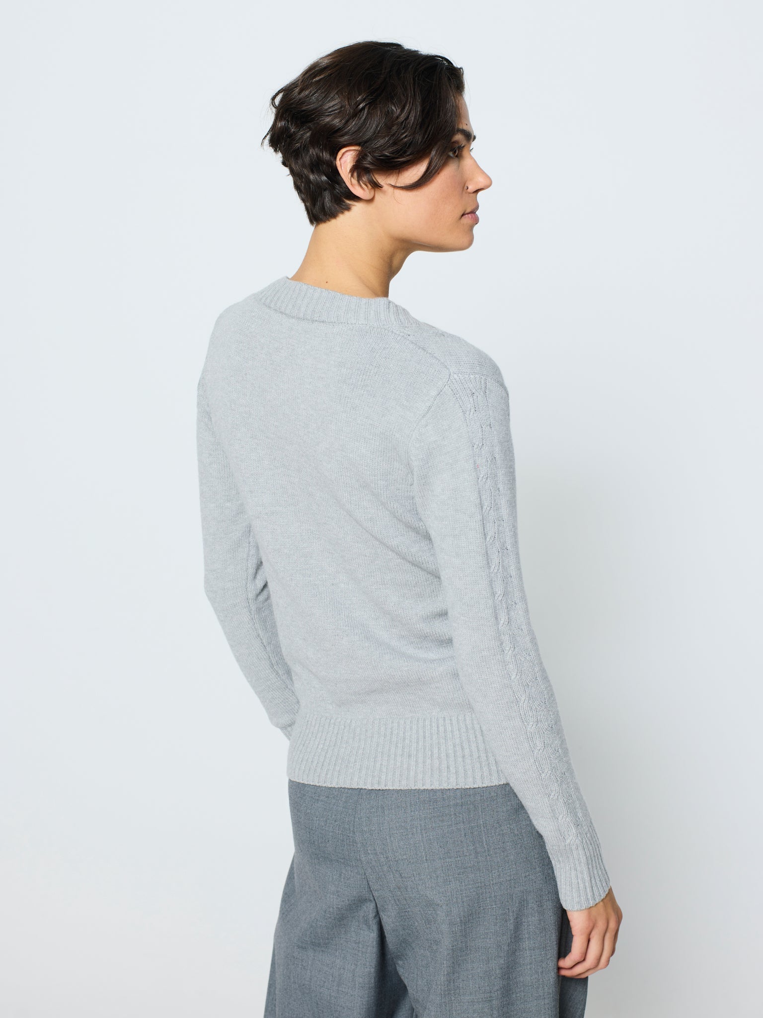 Jersey trenzado cuello pico