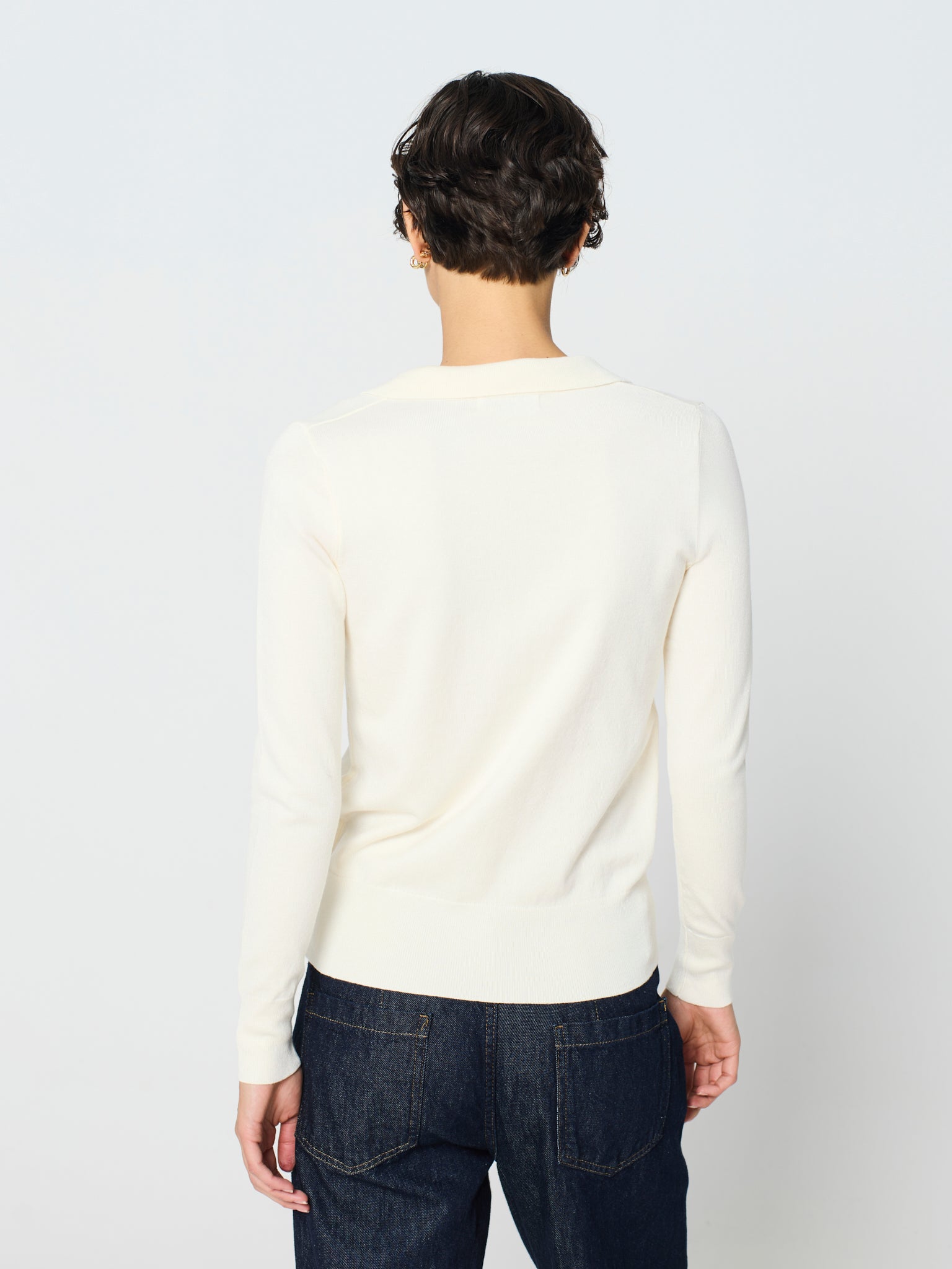 Jersey cuello polo y manga larga con detalle canalé ancho en puños y bajo