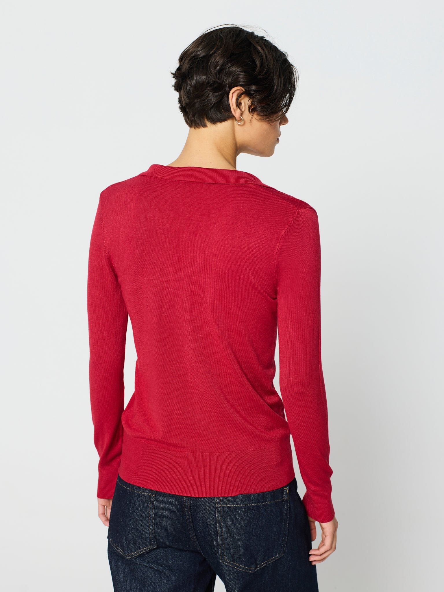 Jersey cuello polo y manga larga con detalle canalé ancho en puños y bajo