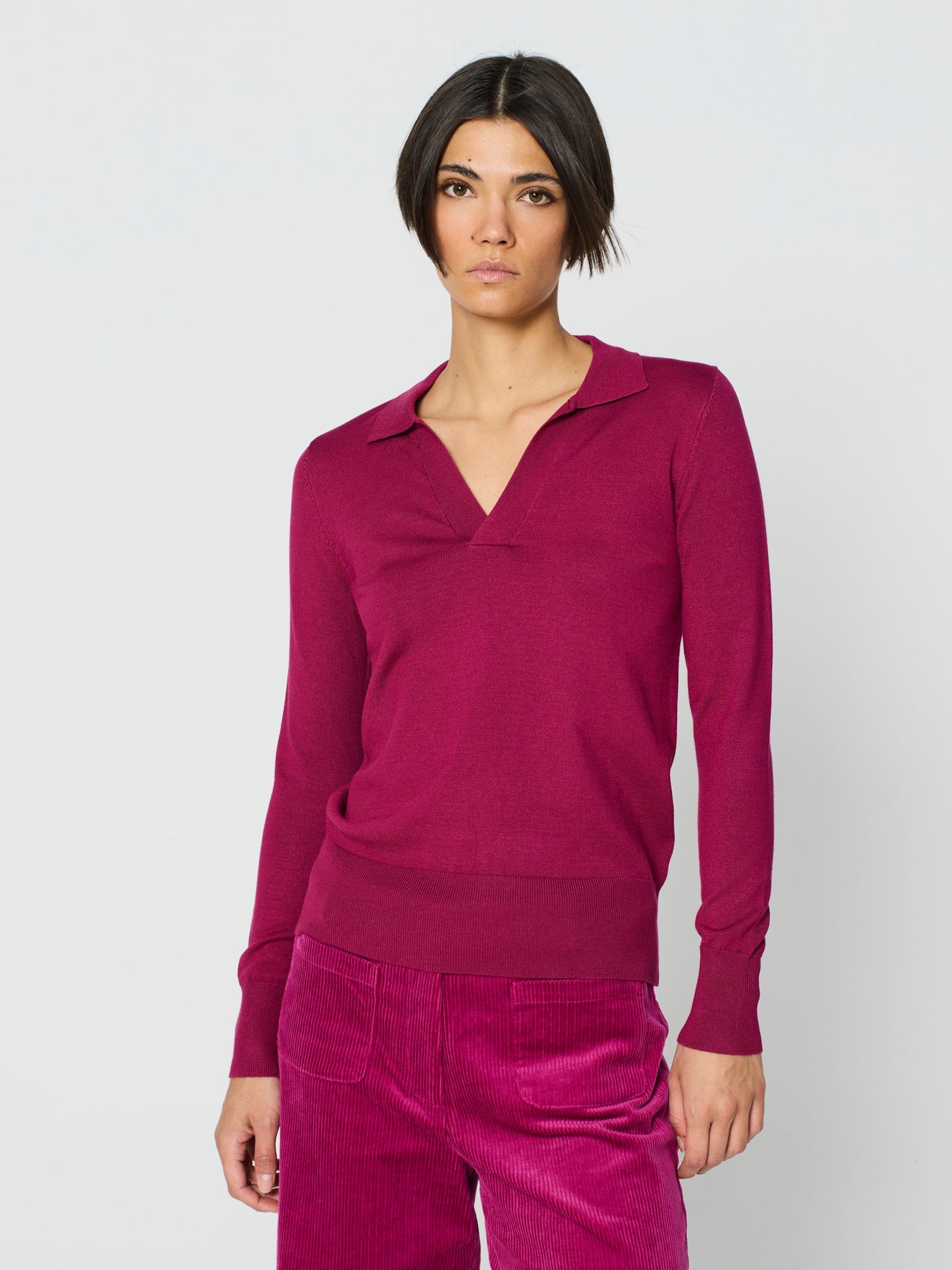 Jersey cuello polo y manga larga con detalle canalé ancho en puños y bajo