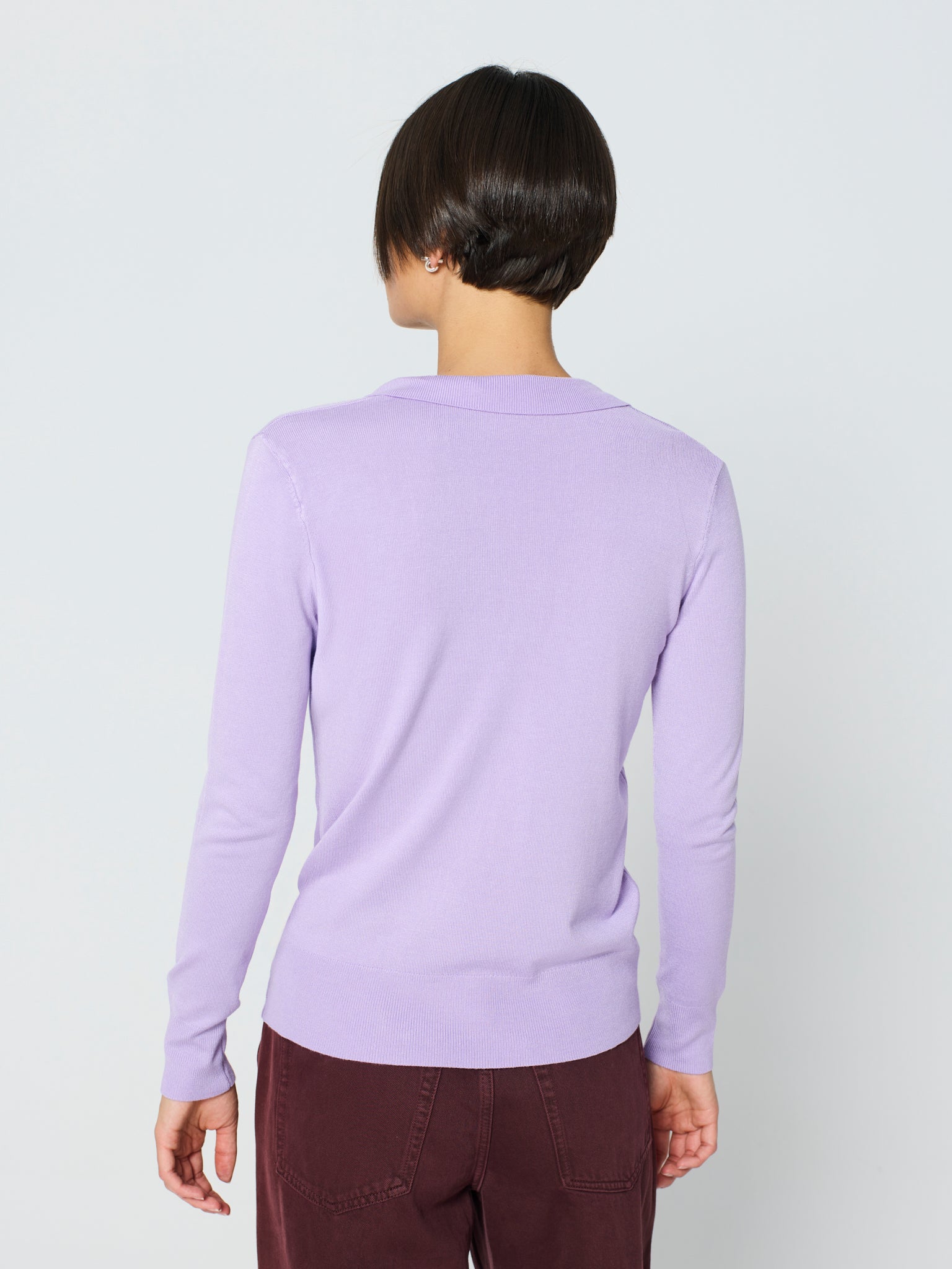 Jersey cuello polo y manga larga con detalle canalé ancho en puños y bajo