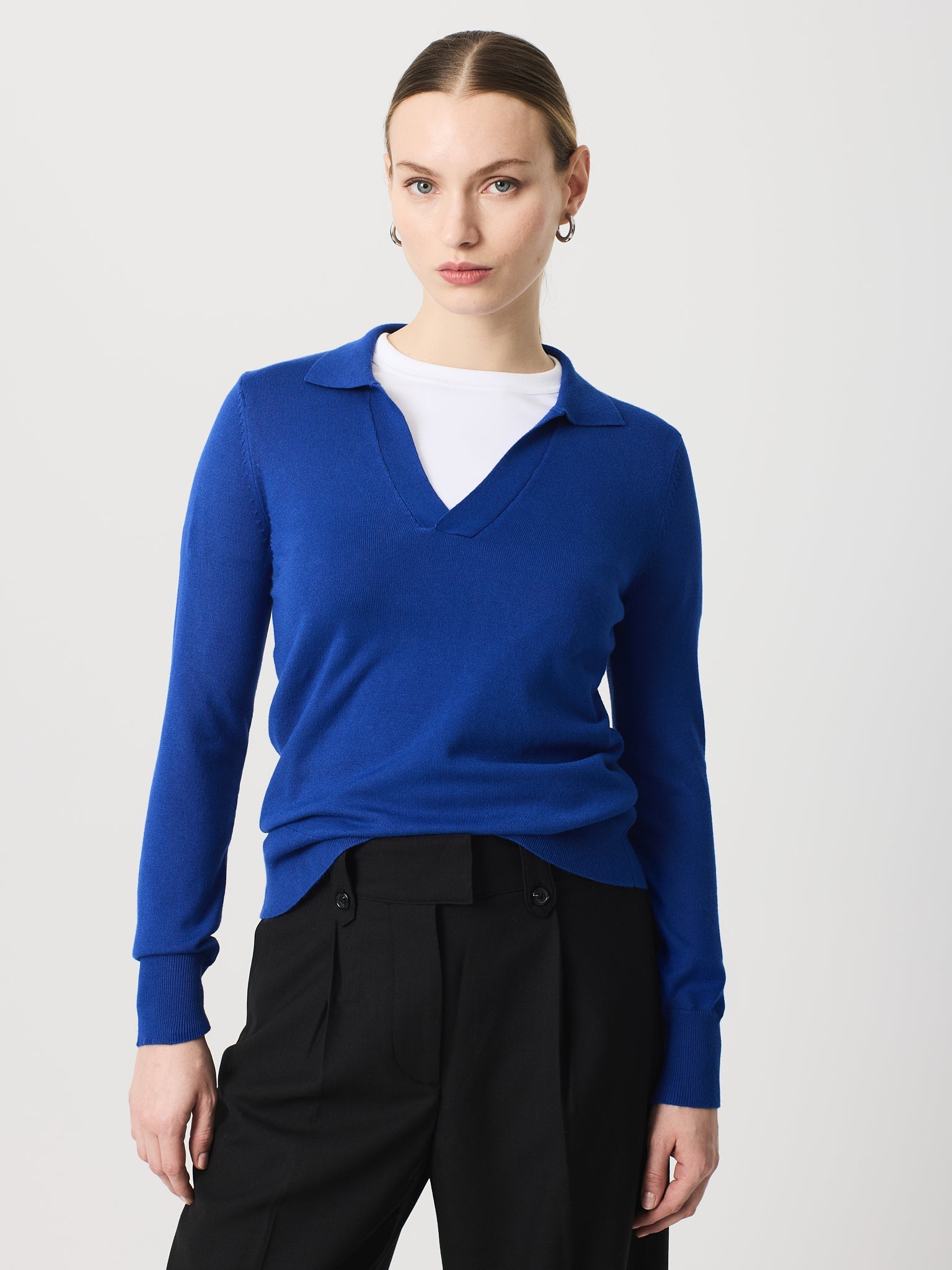 Jersey cuello polo y manga larga con detalle canalé ancho en puños y bajo