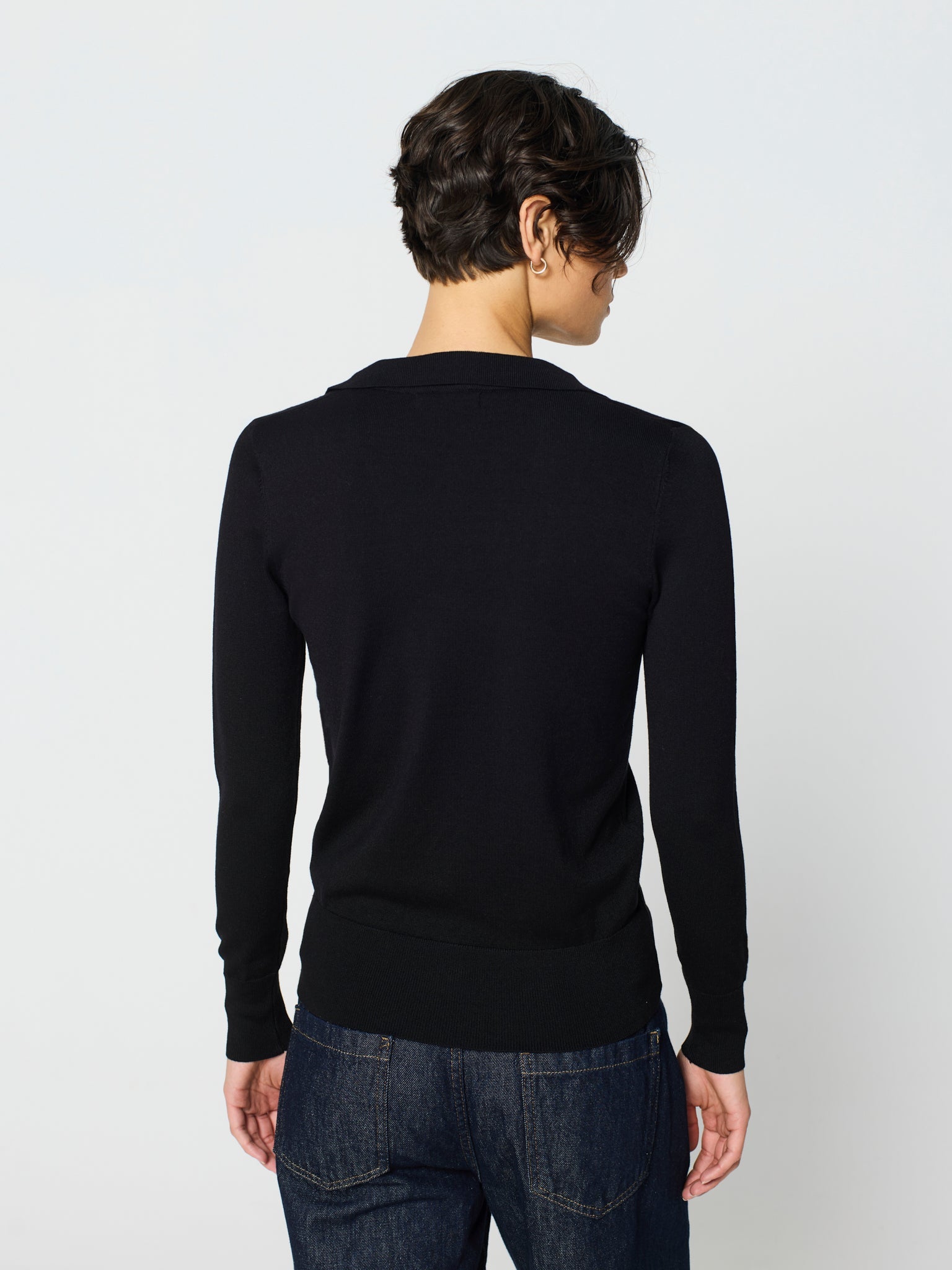 Jersey cuello polo y manga larga con detalle canalé ancho en puños y bajo